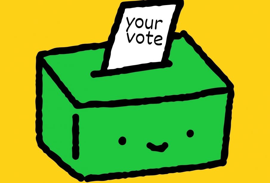 A green box with a smiley face is drawn in front of a yellow background. A paper reading “your vote” is sliding into the box.