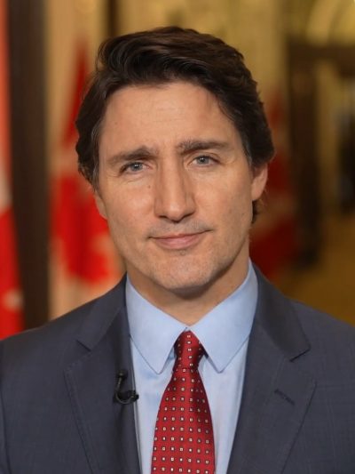 A photo of Justin Trudeau looking into the camera