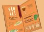 A coloured sketch of an menu with graphics of cutlery, a wine glass, plates of food, etc. among the word “menu” and the phrase “vegan options: not much, but we do have lettuce!”