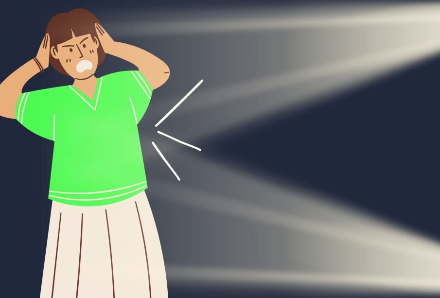 A graphic of headlights shining on someone in a neon green shirt in the dark.