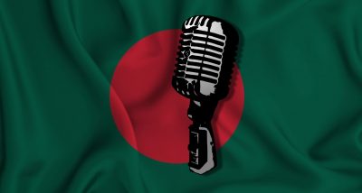 an illustration of a microphone is in front of the flag of Bangladesh. The microphone is in black and white, and the flag in red and green.