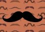 A large black graphic of a handlebar mustache on a light brown mustache-patterned background.