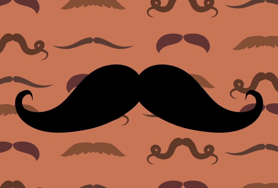 A large black graphic of a handlebar mustache on a light brown mustache-patterned background.