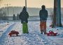 Two children in snow gear pulling red sleds down a snow-covered road.
