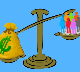 An image of a scale that’s weighing a bag of money and a group of people, the bag of money outweighing the group of people.