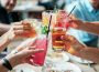 An image of people bringing their drinks together in the fashion of saying “Cheers!” during certain holiday dinners.