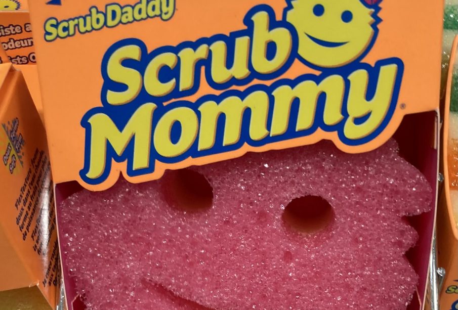 A photo of a scrub, boxed. The product label says Scrub Mommy and has a smiling emoji face.