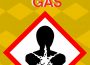 A health hazard pictogram with the words “CHLORINE GAS” in bold red letters above it with a yellow checkered background.