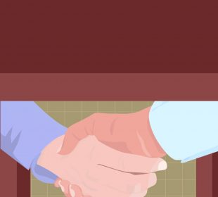 Two hands shake under a table.