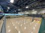 A photo of a University of Regina basketball gym from the second floor of the Centre for Kinesiology, Health, and Sport’s Fitness & Lifestyle Centre.