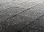 Rain torrents down onto pavement