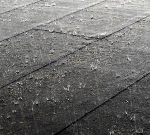 Rain torrents down onto pavement