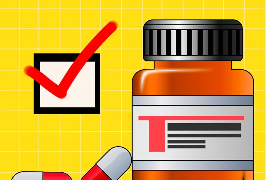 A translucent empty orange pill bottle with two grey and red pills beside it. There is a checkmarked box beside the pill bottle.