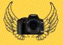 An image of a handheld camera overlaid on an image of angel wings, with a yellow background.