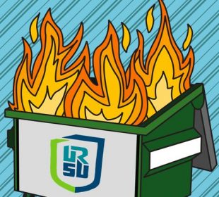 A green dumpster is on fire. URSU’s logo is on the front of it.