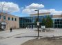 A photo showing the entrance to the Riddell Centre on a nice, sunny day.