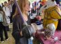 A photo from the U of R’s Welcome Week. In it, a student holds a replica weapon that looks like a rapier.