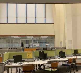 A photo of the main level of Archer library, with empty desks