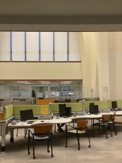 A photo of the main level of Archer library, with empty desks