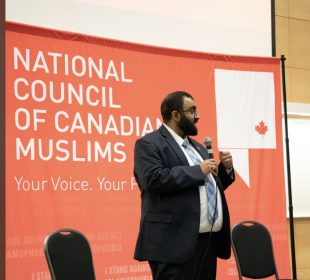 Omar Khamissa gives a talk at NCCM’s conference.