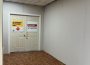A sign is posted on a temporary door reading “authorized personnel only” walls are covering the space where the lab cafeteria is.