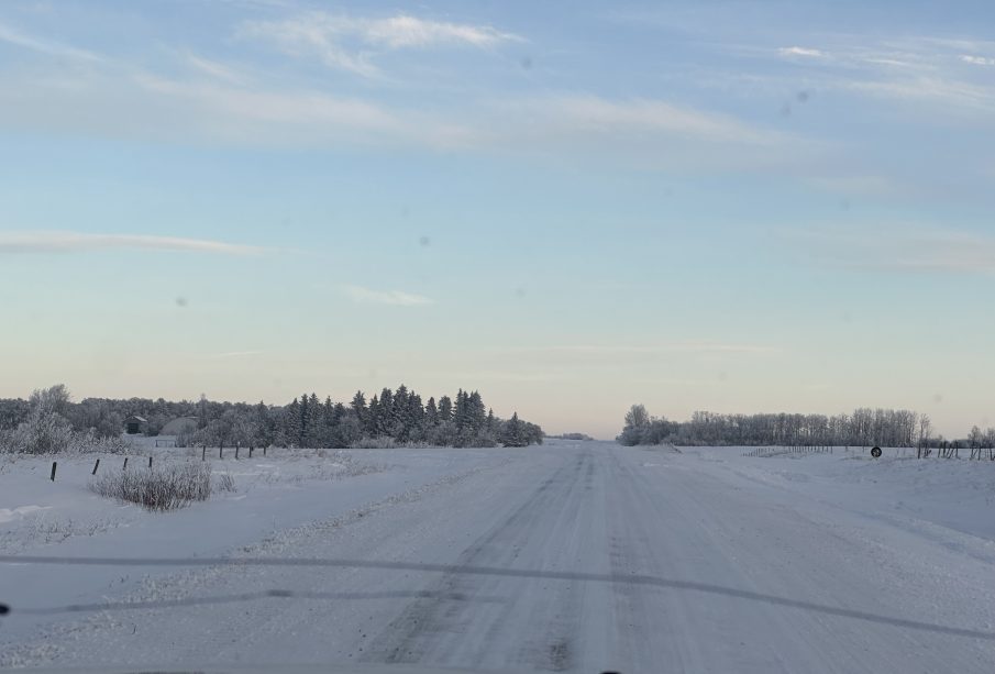 A photo showing the landscape covered in snow as far as one can see.