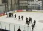 The University of Regina women’s Cougars hockey team celebrating their win on the ice.