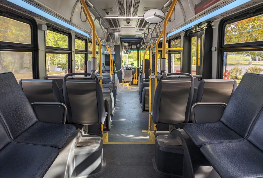 Inside of a bus taken from the back