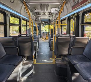 Inside of a bus taken from the back