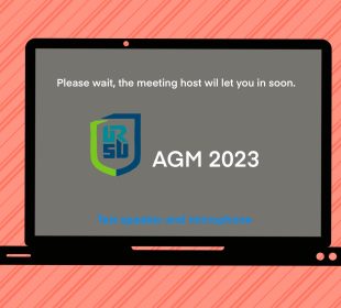 A laptop screen showing a Zoom waiting screen that says “Please wait, the meeting host will let you in soon,” and the URSU logo with the text “AGM 2023.”