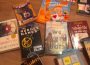 This photo shows a spread of books laid out on the floor. These books range from children’s books, all the way to young adult novels. Some of the classics listed include Diary of A wimpy Kid, The Hunger Games, and The Handmaid’s Tale.