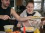 Madi Reynolds (right) sits down to enjoy the meal she has prepared for her best friends on a snowy Sunday in January when they travelled to visit her.