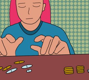 A person sitting at a desk counting change.