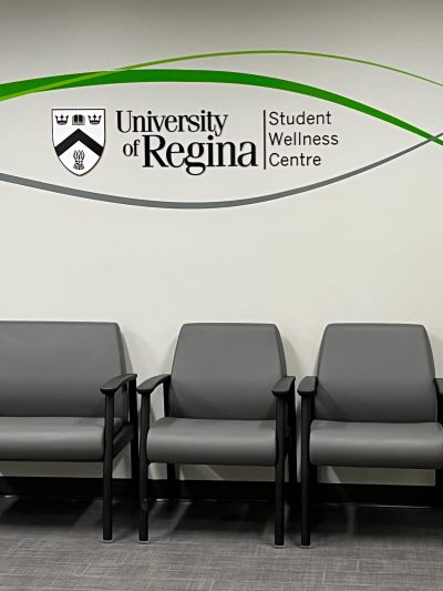 A picture of empty chairs in the waiting room for the Student Wellness Centre on campus.