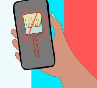 Someone holds a phone in their right hand that shows a paintbrush on the screen covered by a red circle with a line crossing through it diagonally. The background is three vertical stripes coloured white, blue, and red.