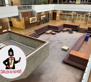 An empty AdHum pit sits desolate from a bird’s eye view. The Carillon the Move series logo sits in the left corner.