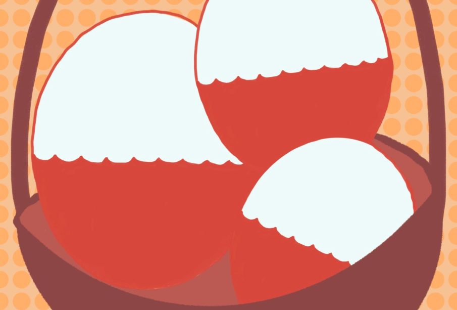 This photo is an illustration of paper eggs in a basket. 