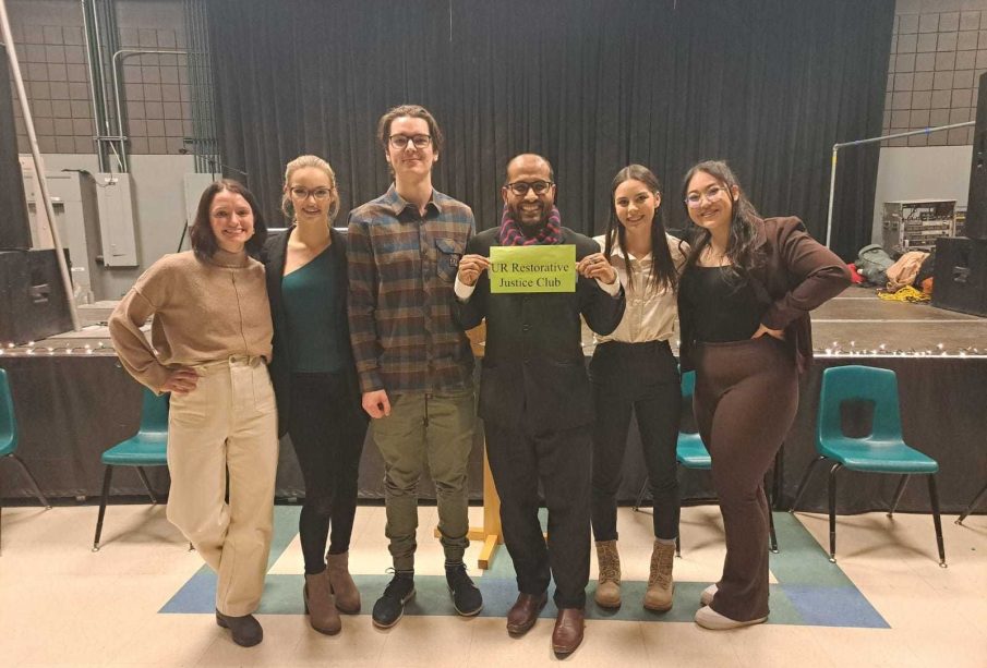 In this picture from left to right are Sophie Daschuk, Co-President; Ashley Layman, Vice President/Social Media Coordinator; Aidan McMartin, Vice President/ Director of Promotions; Dr. Muhammad Asadullah; Kaitlyn Stadnyk, Co-President; and Nicole Mah, Director of Communications/Club Secretary. Missing from photo: Zoë Goetz, Director of Outreach and Joshua Mendoza, Director of Programming"