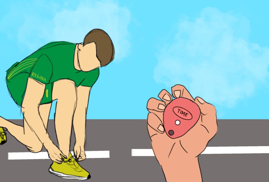 A runner in green and yellow University of Regina-themed athletic wear is kneeling down on a running track, tying the laces on their right shoe while a hand reaches into the frame that’s holding a red stopwatch.