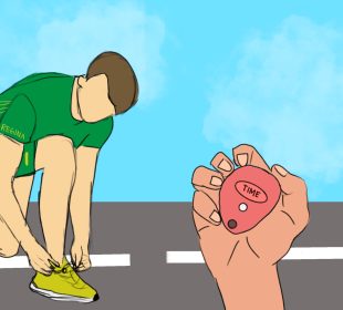 A runner in green and yellow University of Regina-themed athletic wear is kneeling down on a running track, tying the laces on their right shoe while a hand reaches into the frame that’s holding a red stopwatch.