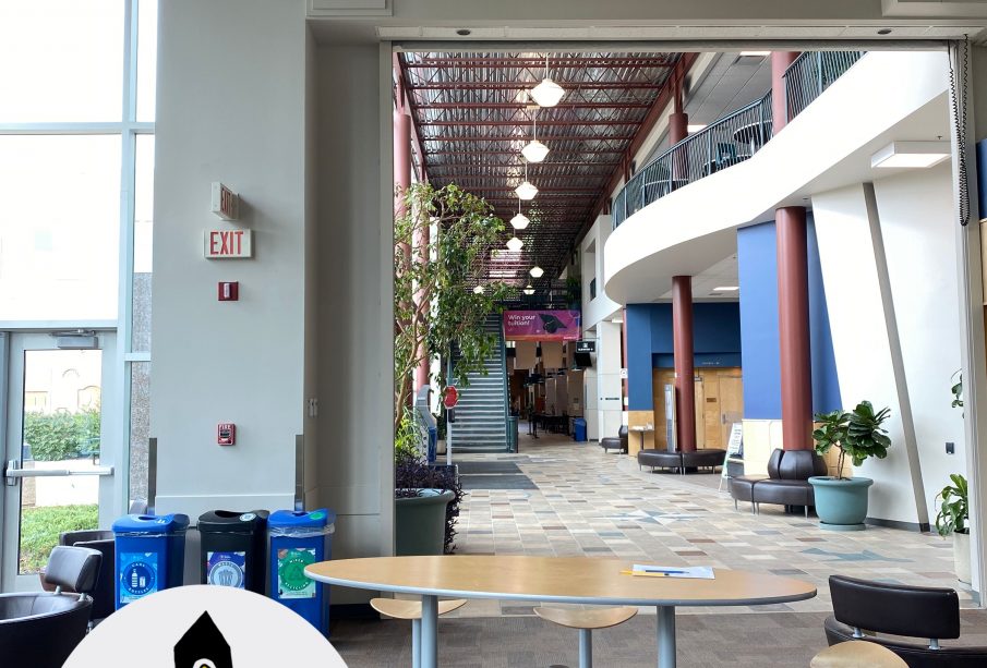 A photo taken from the south side of the Riddell Centre facing North through the main hallway, filled with sunlight and sporting the “Carillon on the move” series logo in the bottom left.