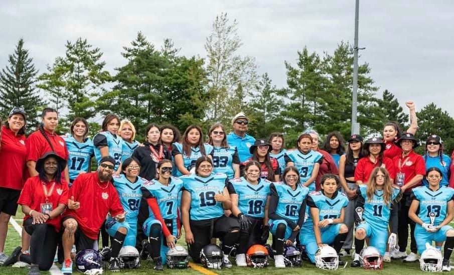 A team photo of the U18 Indigenous women’s football team, with new coach Jill Fast.