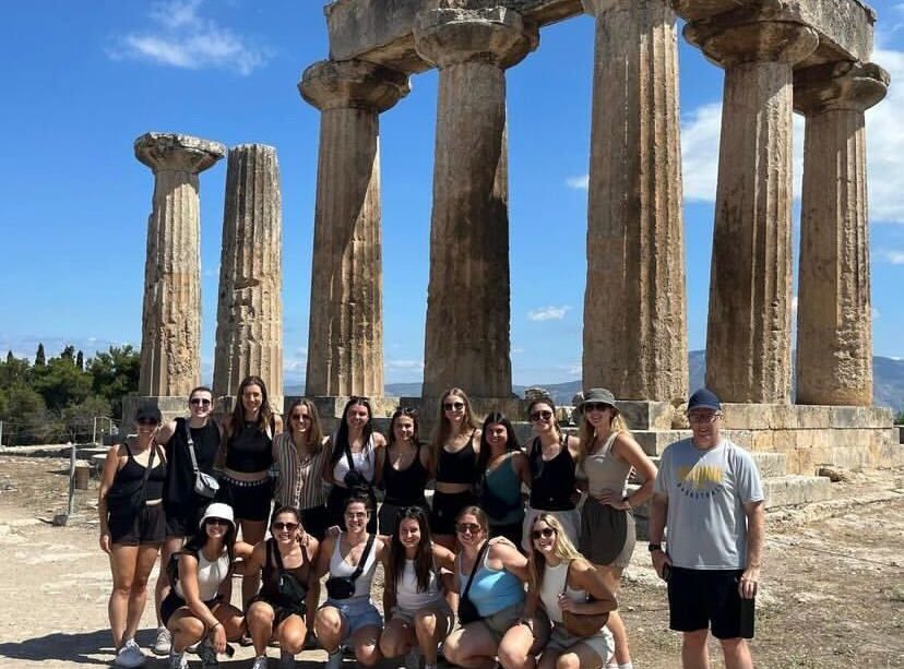 The Cougar women’s basketball team pose for a photo on their Greece trip.