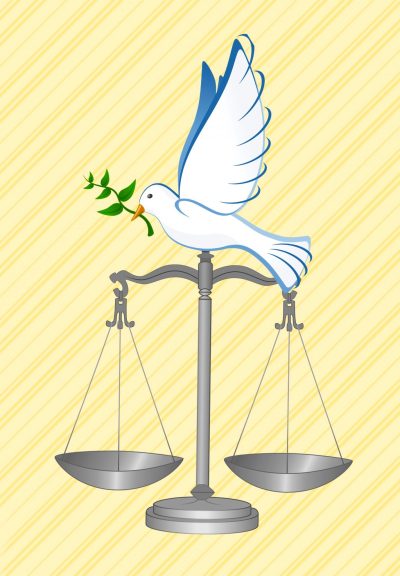 A dove with a sprig of greenery in its beak sits atop a weigh scale.