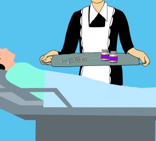 A traditional looking maid in black uniform stands beside a hospital bed and patient holding a serving tray of syringes and drugs.