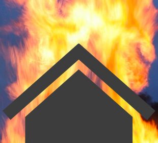 The black outline of a home is backlit by destructive flames.