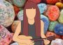 A drawing of Colleen Ballinger playing her ukulele with a background of multi-coloured rocks.