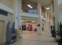 A photo of a corridor, with some vending machines visible. A sign says “Student Wellness Centre.”