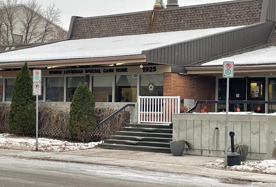 A photo of Regina Lutheran Home’s front entrance from the sidewalk across from the building. 