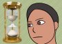 A person staring at an hourglass.